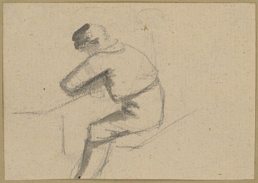 A seated male figure leaning over a table