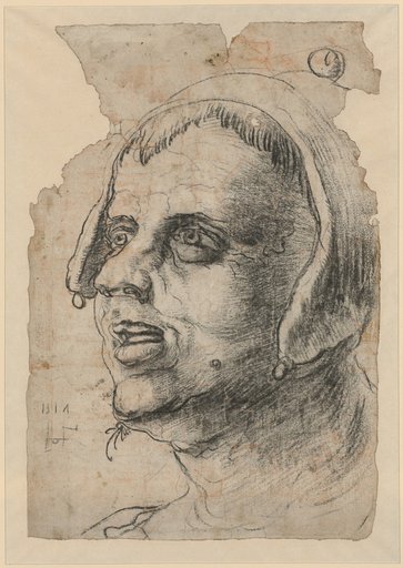 Man's head with a jester's cap
