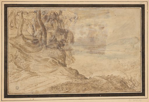 Path at the edge of the forest, view to the valley with settlements on the right