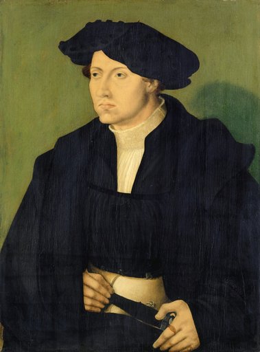 Portrait of a Man in Black Clothing