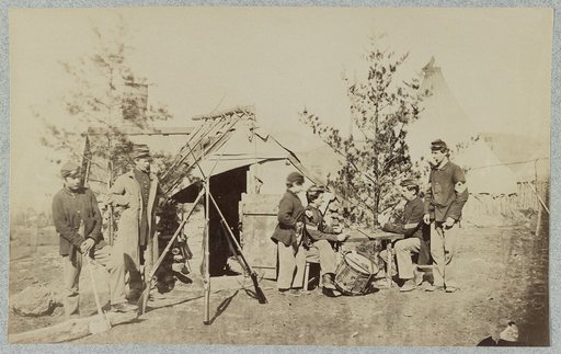 Drummer boys off duty, playing cards in camp, winter of 1862