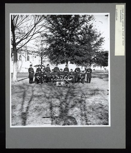 Band group seated behind their instruments