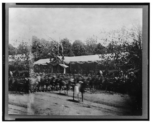 Mounted cavalry riding past reviewing stand during the "grand review" of the Union Army, Washington, D.C.
