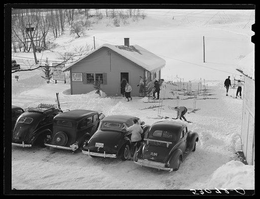 Every available space for parking is used by skiers on weekends at Clinton Gilbert's farm. The house is about eight years old; purchased by Gilbert in 1929. He has about 150 acres, mainly a dairy farm with twenty three cows. He also makes about one hundred gallons of maple syrup every year. First sk