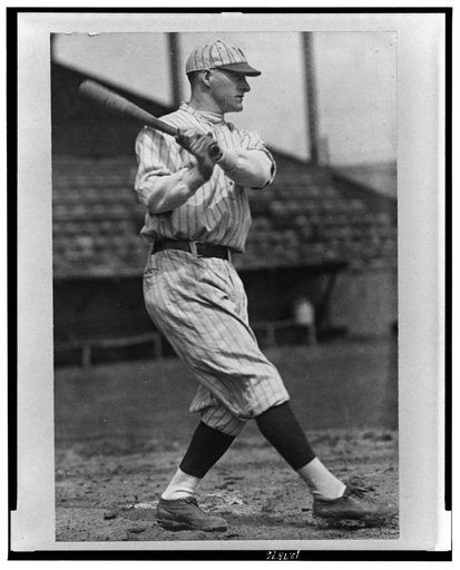 Robert William Meusel, New York Yankees outfielder, full-length portrait, facing right, swinging baseball bat
