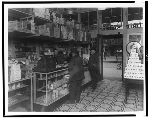 Interior of People's Drug Store, 14th and U(?) Streets, Washington, D.C., with employees and customers