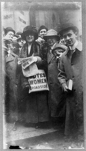 Distributing suffrage broadsides, January 1911