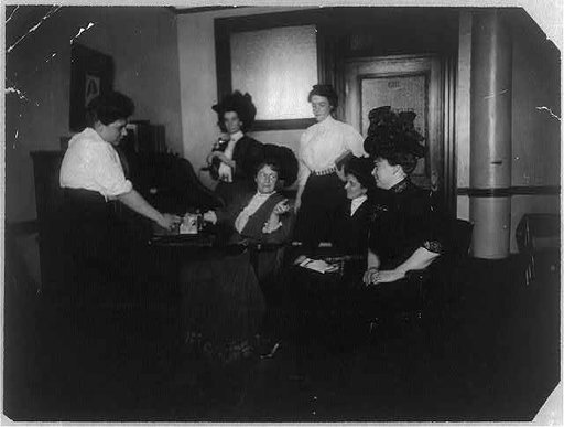 Suffragette headquarters, 32 Union Square, NYC. Mrs. Harriot Blatch seated with Miss Weiss and others
