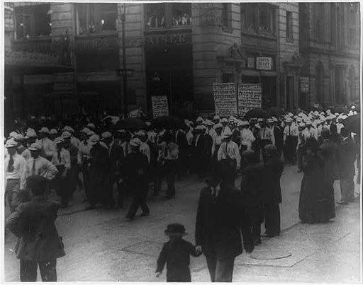 Socialist demonstration - parade in New York City, carrying signs in Yiddish