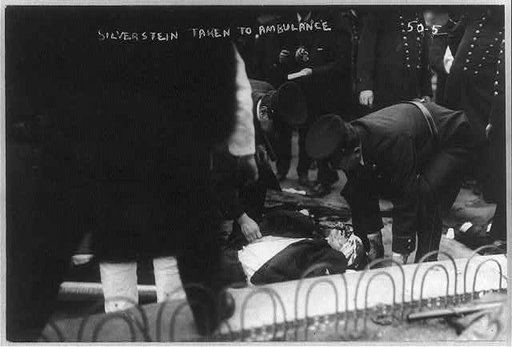 Anarchists - casualty of Anarchist riot, taken to ambulance, Union Square