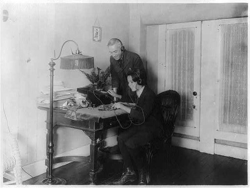 Man & boy with radio