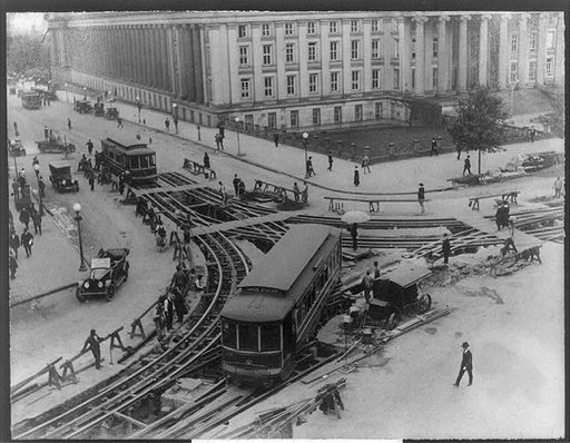 Trolley car passing street construction at corner of Pennsylvania & F. St., looking toward Treasury Building, Washington, D.C.