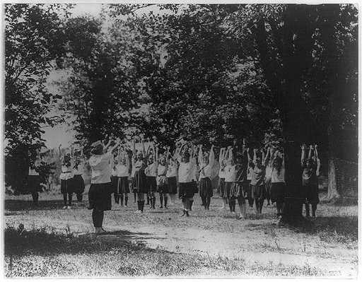 Girls from Washington, D.C., at Y.W.C.A. camp near Winona, Maryland, doing outdoor exercises