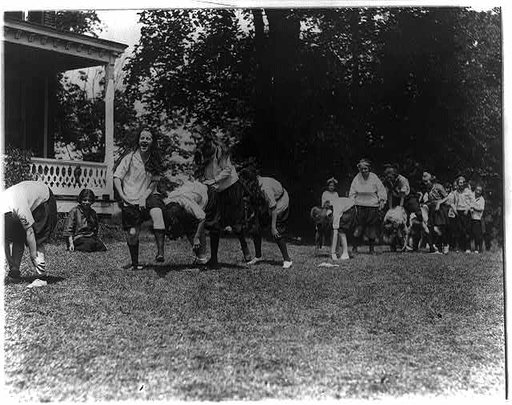 Girls from Washington, D.C., at Y.W.C.A. camp near Winona, Maryland, playing leapfrog
