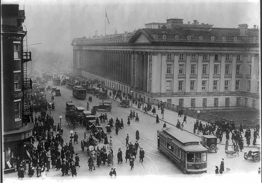 Washington, D.C. - Treasury Building from corner of 15th & G St., crowded with traffic, low aerial view