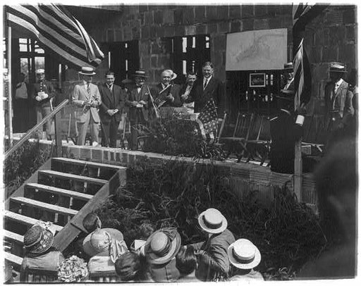 General view at the laying of the Congressional Country Club Corner Stone - Herbert Hoover behind table, with others