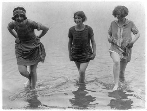 Three models from Washington's spring fashion show [wading] snapped at Arlington Beach