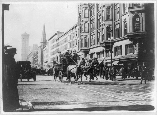 Horse-drawn fire engines in street, on their way to the Triangle Shirtwaist Company fire, New York City