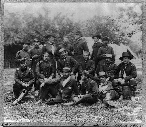 Group at Headquarters of Army of Potomac, Falmouth, Va.: J.S. Crocker, Ulris Dahlgren, B.C. Ludlow, A.N. Duffie, E.R. Warner, Lord Abinger, J. Dickinson, S.F. Barstow, J.B. Howard, D.W. Flagler, Harry Russell, J.R. Coxe and 4 unidentified men.