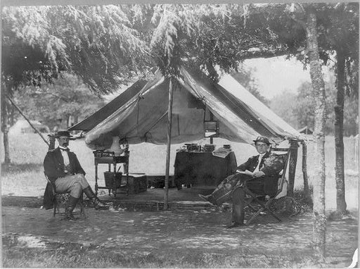 2 officers of the staff of General A.A. Humphrey [seated in front of tent