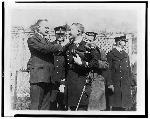President Coolidge] decorating Lieut. Tho[ma]s J. Ryan with the Congressional Medal of Honor