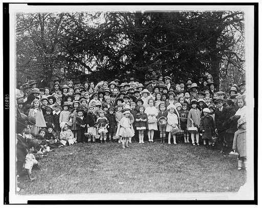 A group of happy y[oungst]ers who rolled their Easter eggs [on] the White House lawn today