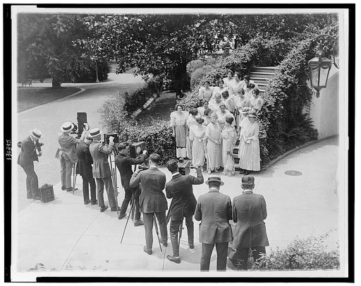 Mrs. Harding and wives of the Philippine commissioners whom she entertained today, being filmed at the White House