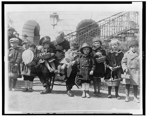 Edgar E. Porter, one of the White House policeman, was detailed to care for the lost and strayed children during the Easter egg rolling at the White House today