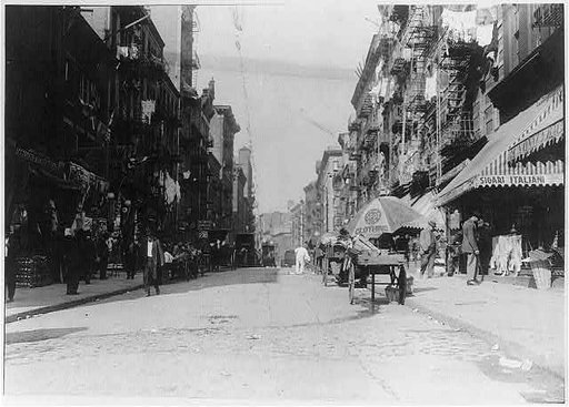 Where bread is sold on the street. Mott Street, New York City