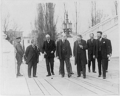 Members of World Disarmament Conference, Washington, D.C., 1921: Members of the "Big Nine" walking on plaza - Charles Evans Hughes in middle
