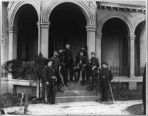 Major General E[dwin] V[ose] Sumner and staff [including Alonzo Hersford Cushing on porch
