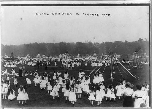 School children in Central Park, [New York City, with May poles