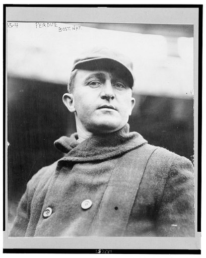 Hubbard, i.e., Herbert Rodney "Hub", Perdue, Boston Braves baseball player, head-and-shoulders portrait, facing front, wearing coat and hat