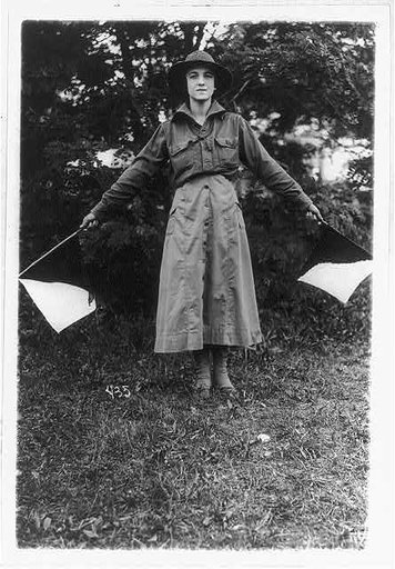 "Wig wag girl" of the Woman's Defense League in the camp near Washington, D.C.