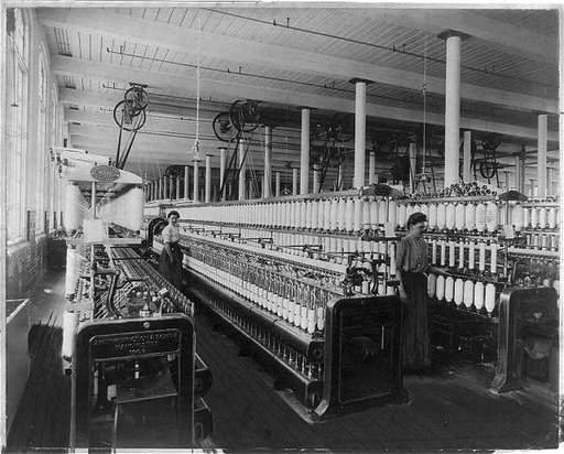 Textile factory with two women at machines