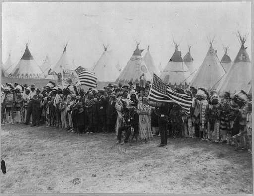 A section of the ring of Indians of 20 nations who gathered around the flag pole for the flag raising ceremony on the site of old Fort Union