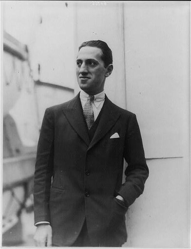 George Gershwin, 1898-1937, half-length portrait, standing, facing left
