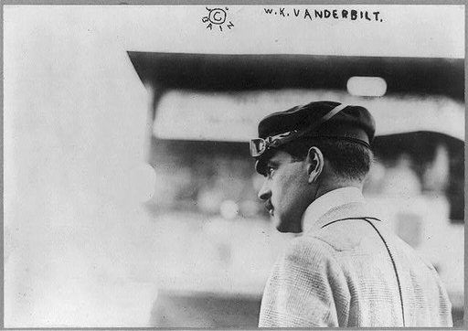 William Kissam Vanderbilt II, 1878-1944, head-and-shoulders portrait, with racing cap and raised goggles