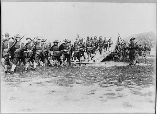 N.Y. National Guard training and maneuvers at Fishkill and Peekskill, N.Y.: Column of troops crossing dry bridge construction by engineers