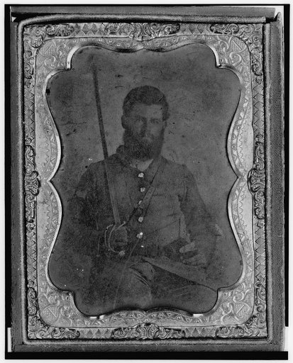 James S. Dodd, Pvt., Co. C, 4th South Carolina Cavalry, half-length portrait, seated holding saber, facing front