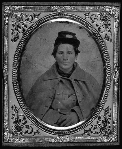 Jonas Nathan Shuler, Private, 10th Ill. Cav., U.S.A., half-length portrait, seated, facing front