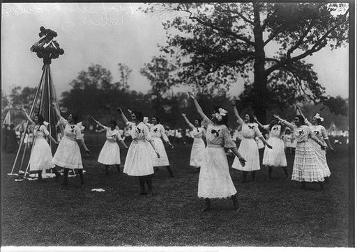 New York City school children. Teen-aged girls dancing at May Pole, May 1913