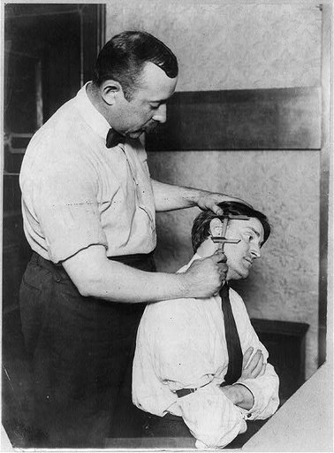 New York City Police Dept. activities: taking Bertillon measurements--ear