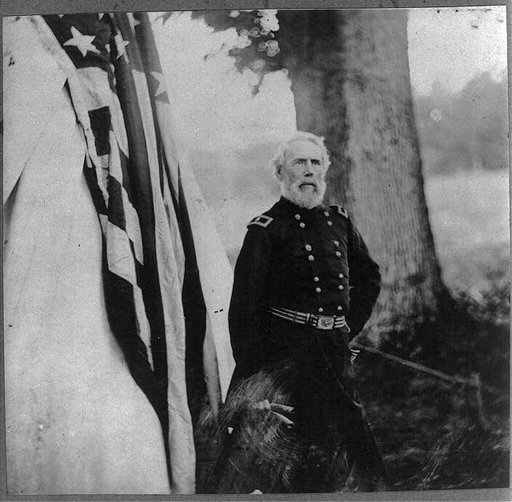 Maj. Gen. Edwin Vose Sumner, 1797-1863, three-quarter length portrait, standing, facing right, in uniform, outside tent