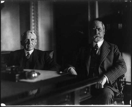Frank B. Kellogg, Ambassador to England ,and Secretary of State Hughes in Mr. Hughes' office, on the day of the announcement of Mr. Kellogg's appointment as his successor