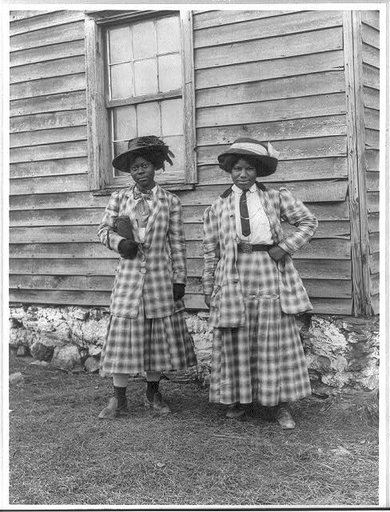 Two young African American women, probably somewhere in Virginia