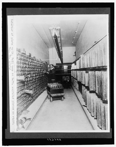 Interior of plate vault. Roll case on left, engraved plates on right