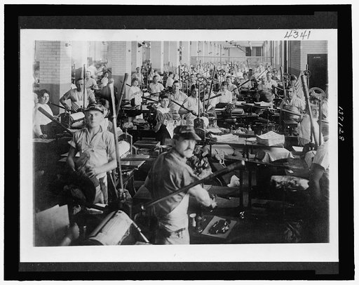Employees at their workstations at the Bureau of Engraving and Printing