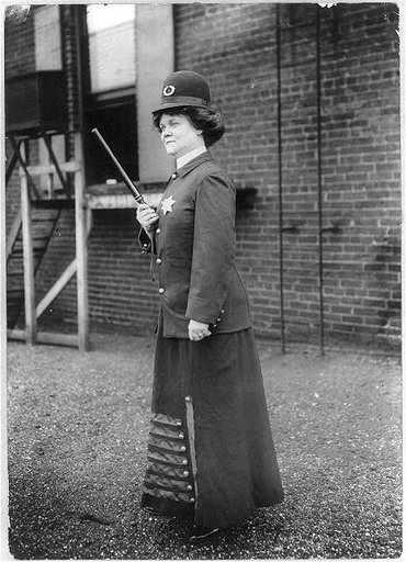 Policewomen - the woman "Cop" (a dream). Suffragette posed to illus. woman police concept - Cincinnatii
