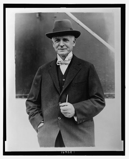 Fairfax Harrison, president of Southern Railway, half-length portrait, standing, facing front, on board ship